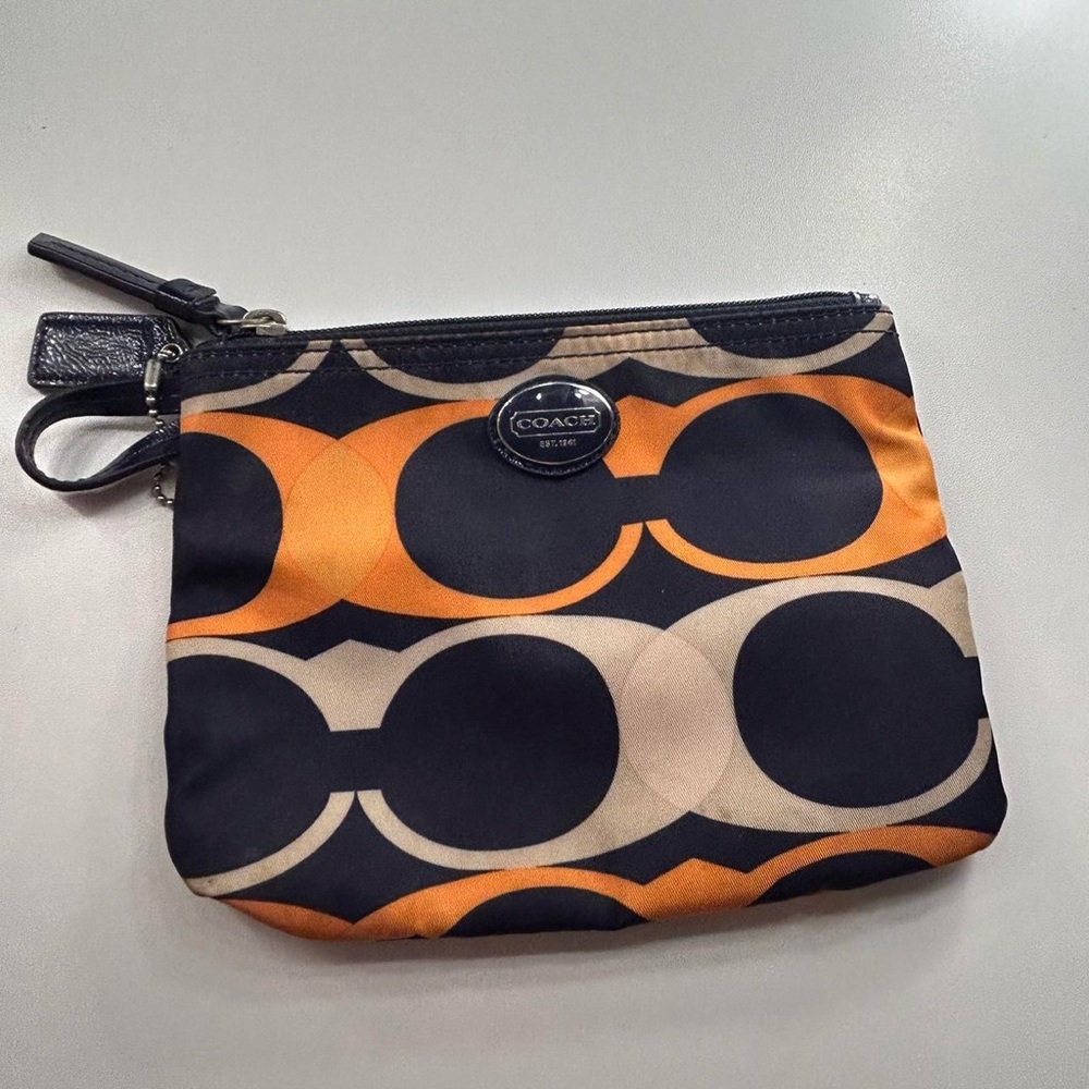 Coach coin purse (matching purse)  
Old but no flaws